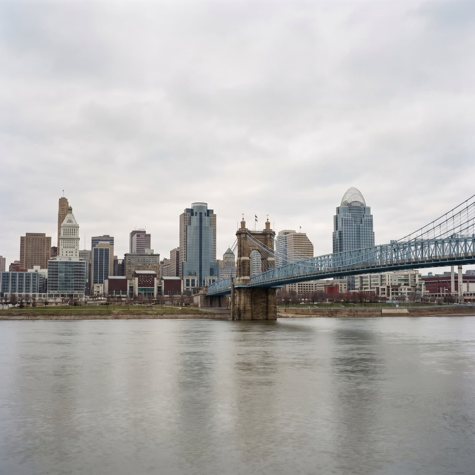 Cincinnati, OH — Roebling Suspension Bridge over the Ohio River with the downtown Cincinnati skyline