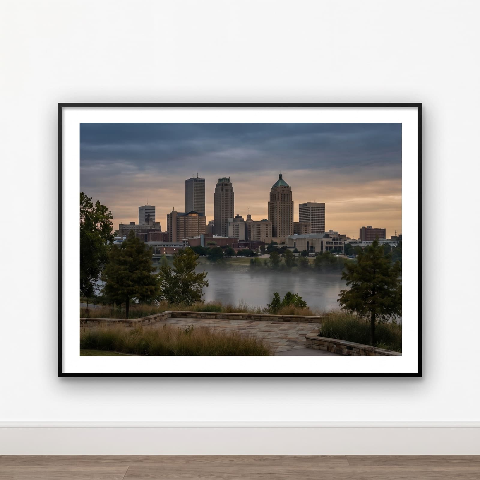 Tulsa, OK — Art Deco skyline above the Arkansas River from the Gathering Place at dusk